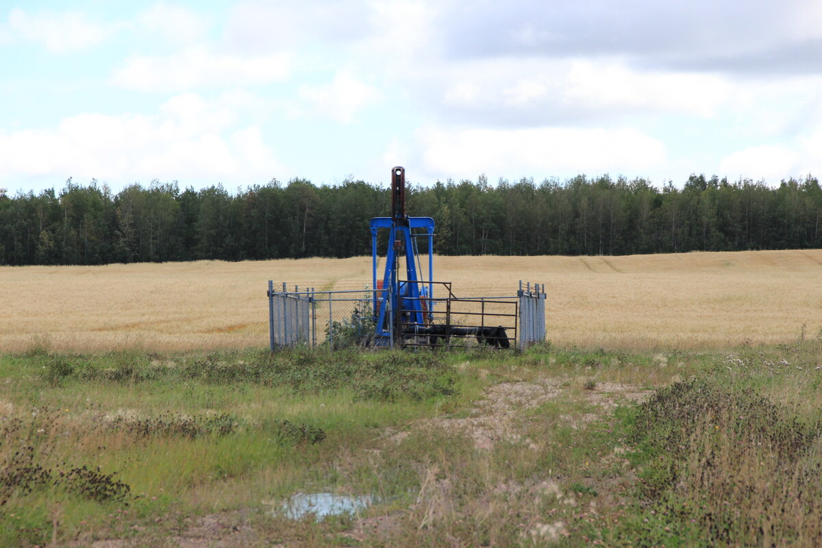 Aging oil well infrastructure across rural Alberta, representing the $60 billion cleanup crisis that companies want taxpayers to pay for
